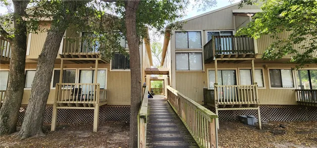 a car parked in front of a house