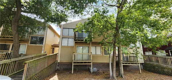 a car parked in front of a house