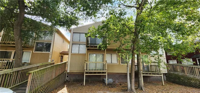 a car parked in front of a house