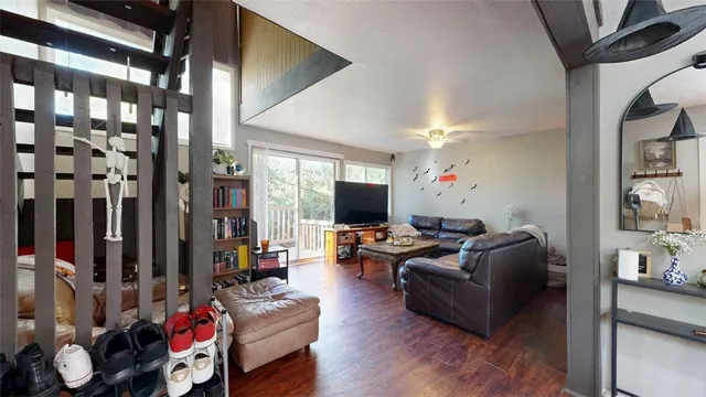 a room with furniture and wooden floor