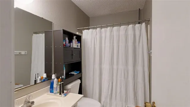 a view of a car park in front of house