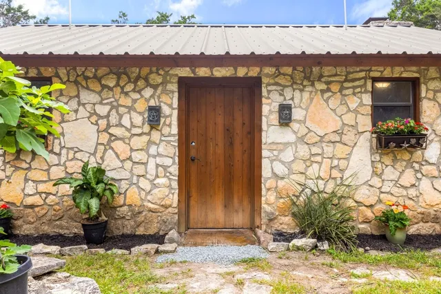 a view of a terrace with a water view and mountain view