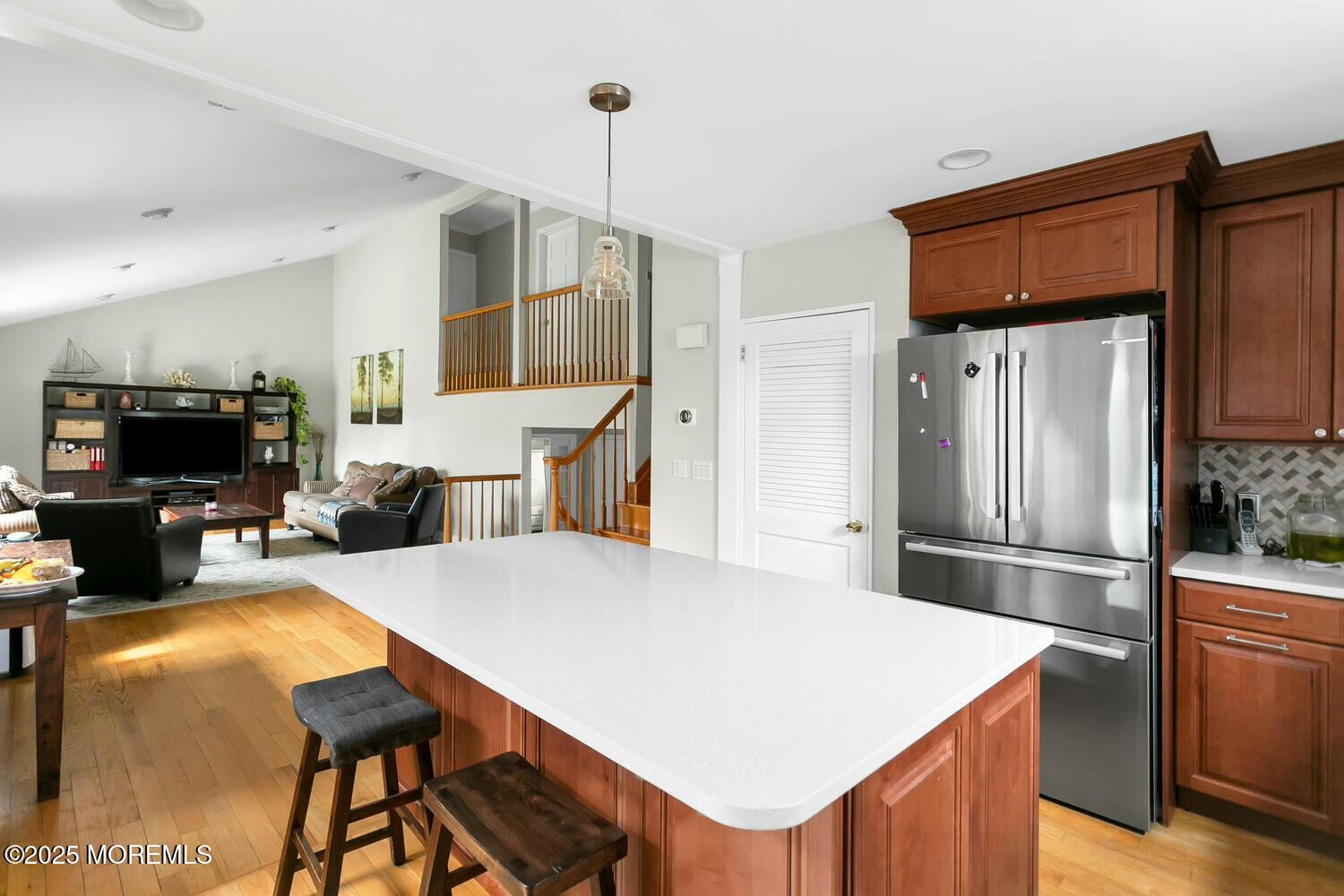 21 Judith Road Little Silver, NJ 07739 - Photo 12 of 48 a kitchen with stainless steel appliances a refrigerator and a stove top oven