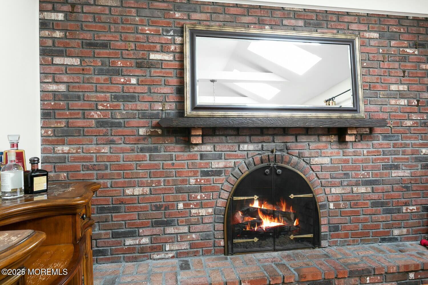 21 Judith Road Little Silver, NJ 07739 - Photo 15 of 48 a living room with a fireplace