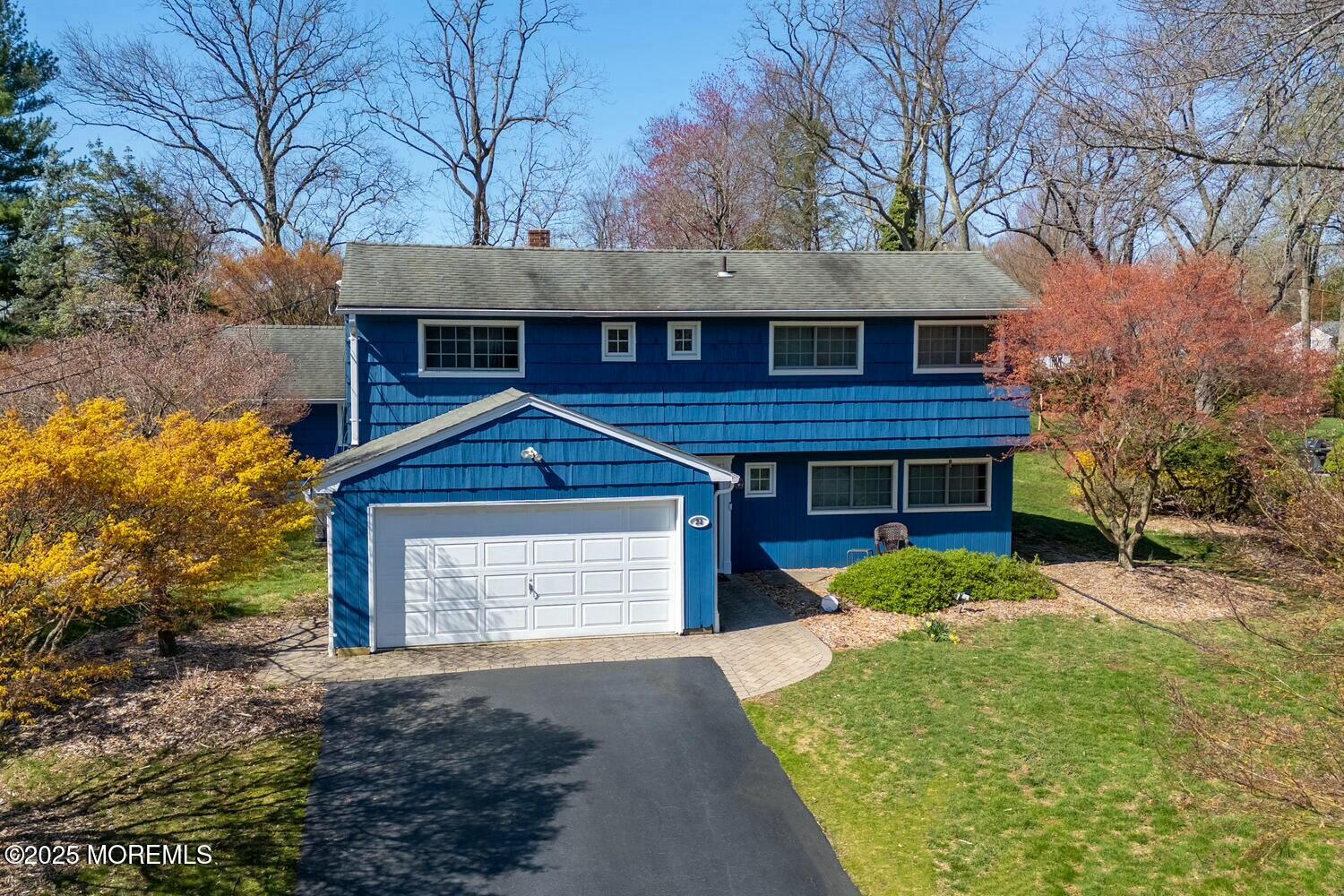 21 Judith Road Little Silver, NJ 07739 - Photo 2 of 48 a front view of a house with garden