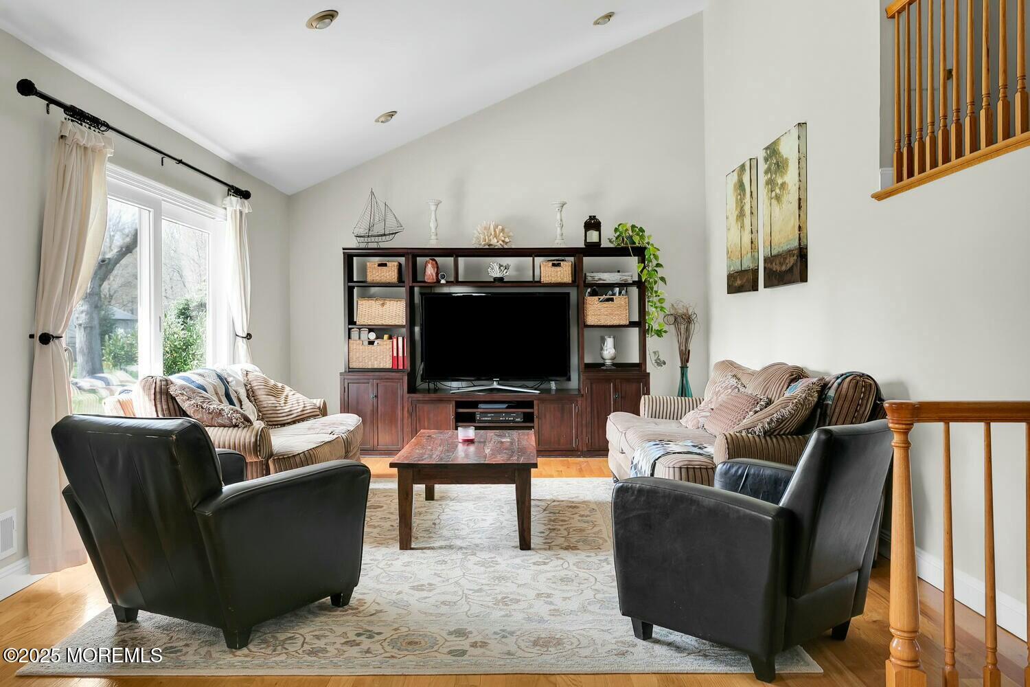 21 Judith Road Little Silver, NJ 07739 - Photo 21 of 48 a living room with furniture and a flat screen tv
