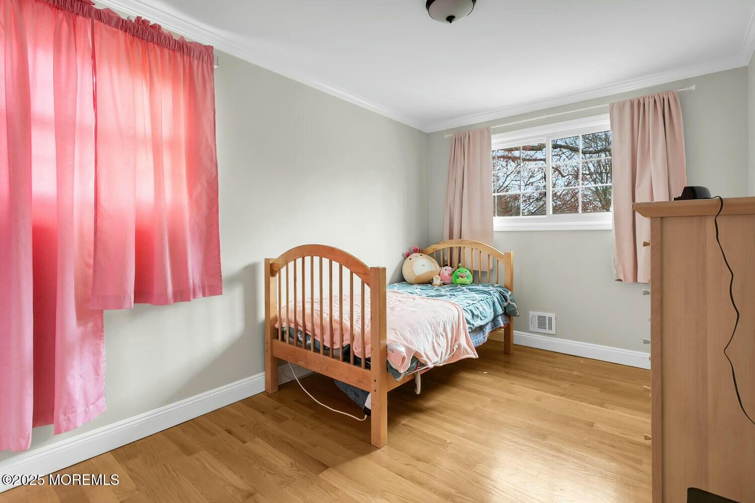21 Judith Road Little Silver, NJ 07739 - Photo 28 of 48 a bed room with a bed and a window