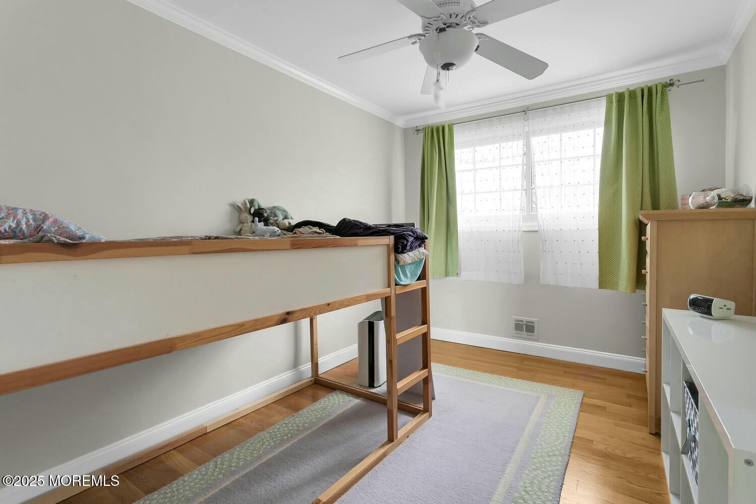 21 Judith Road Little Silver, NJ 07739 - Photo 29 of 48 a view of room with window and wooden floor