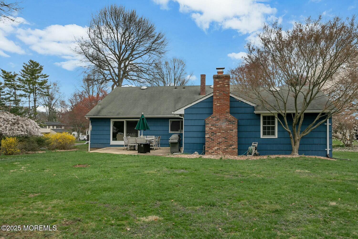21 Judith Road Little Silver, NJ 07739 - Photo 40 of 48 a front view of a house with a yard and trees