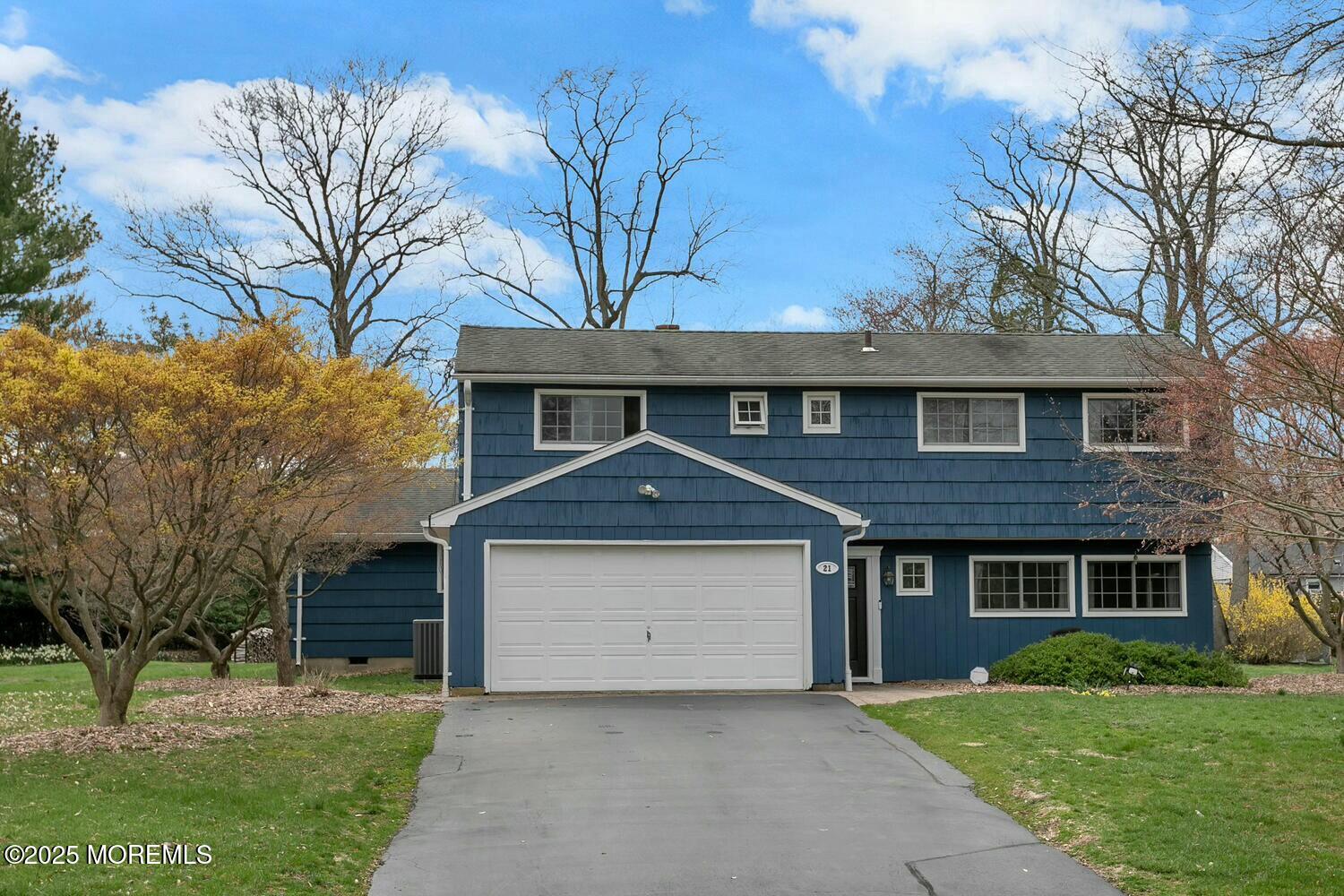 21 Judith Road Little Silver, NJ 07739 - Photo 6 of 48 a front view of a house with garden