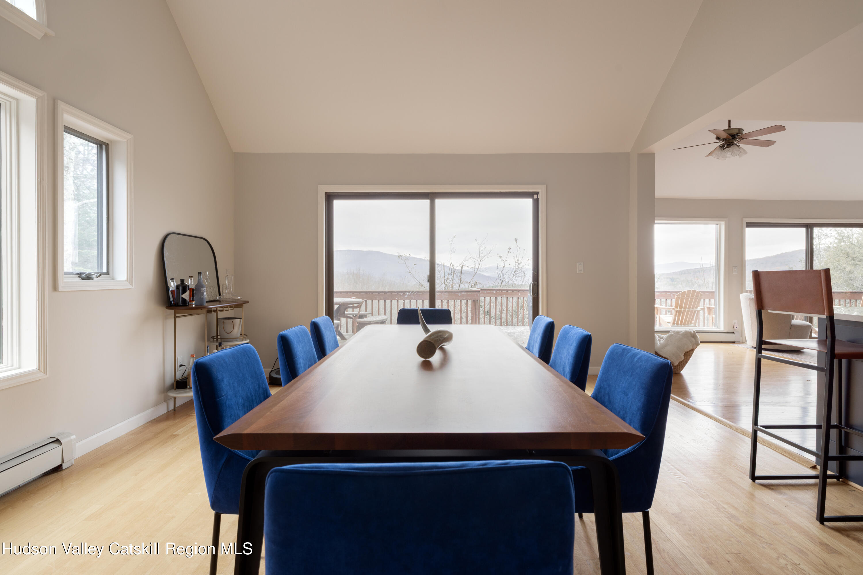51 Barnum Road Windham, NY 12454 - Photo 13 of 41 a view of a dining room with furniture window and wooden floor
