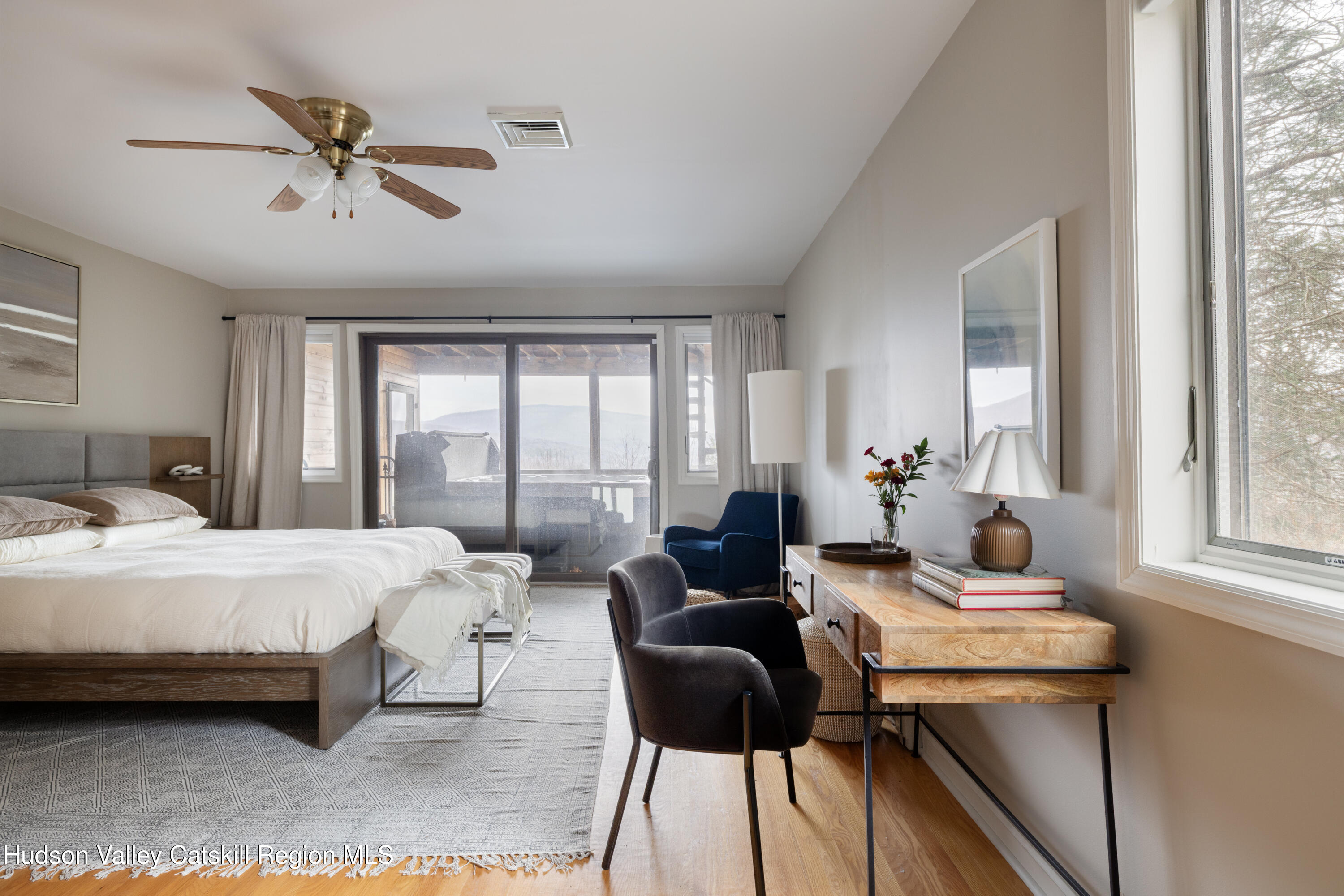 51 Barnum Road Windham, NY 12454 - Photo 16 of 41 a bedroom with a bed and windows