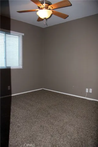 a room with workbench and window