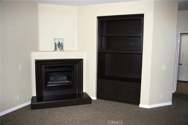 a living room with a fireplace