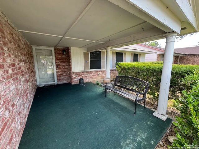 a house view with a garden space