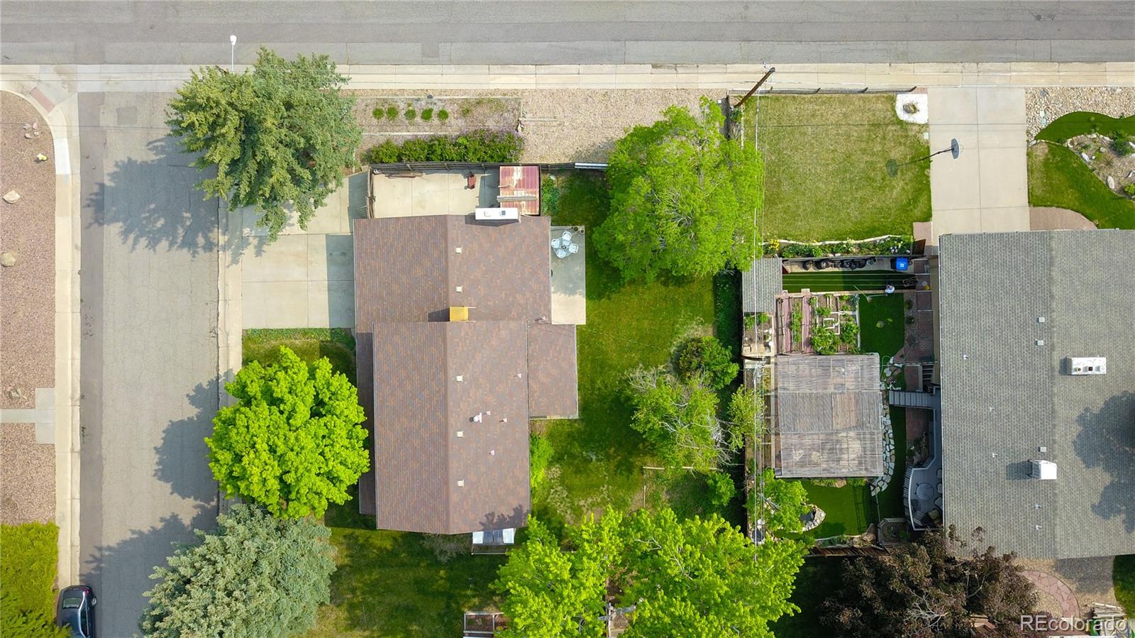 6001 Welch Street Arvada, CO 80004 - Photo 31 of 32 an aerial view of a house with a garden