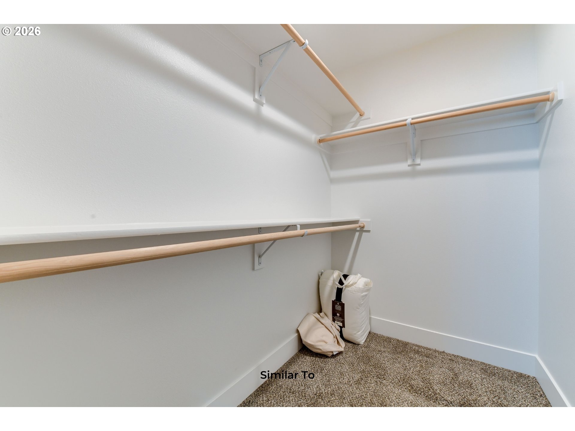 227 Southwest Goldfinch Lane Boardman, OR 97818 - Photo 20 of 28 a view of a room with wooden floor and cabinet