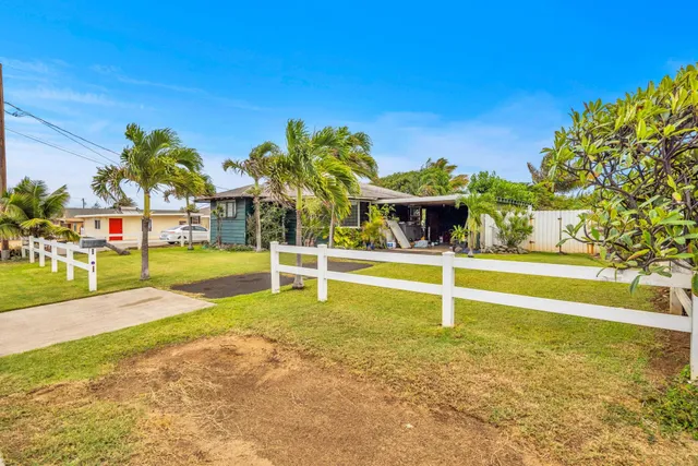 a view of an swimming pool with an outdoor space and seating area