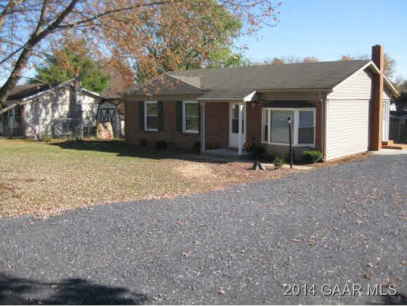 834 Augusta Farms Road Waynesboro, VA 22980 - Photo 1 of 17 a front view of a house with a yard and garage