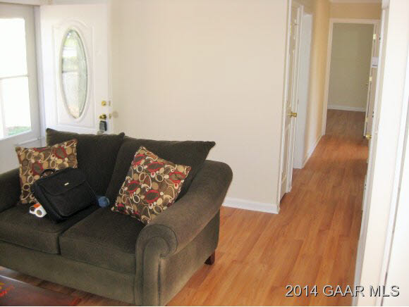 834 Augusta Farms Road Waynesboro, VA 22980 - Photo 6 of 17 a living room with furniture and a wooden floor
