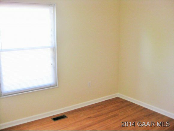 834 Augusta Farms Road Waynesboro, VA 22980 - Photo 10 of 17 a view of a small space with wooden floor and a window
