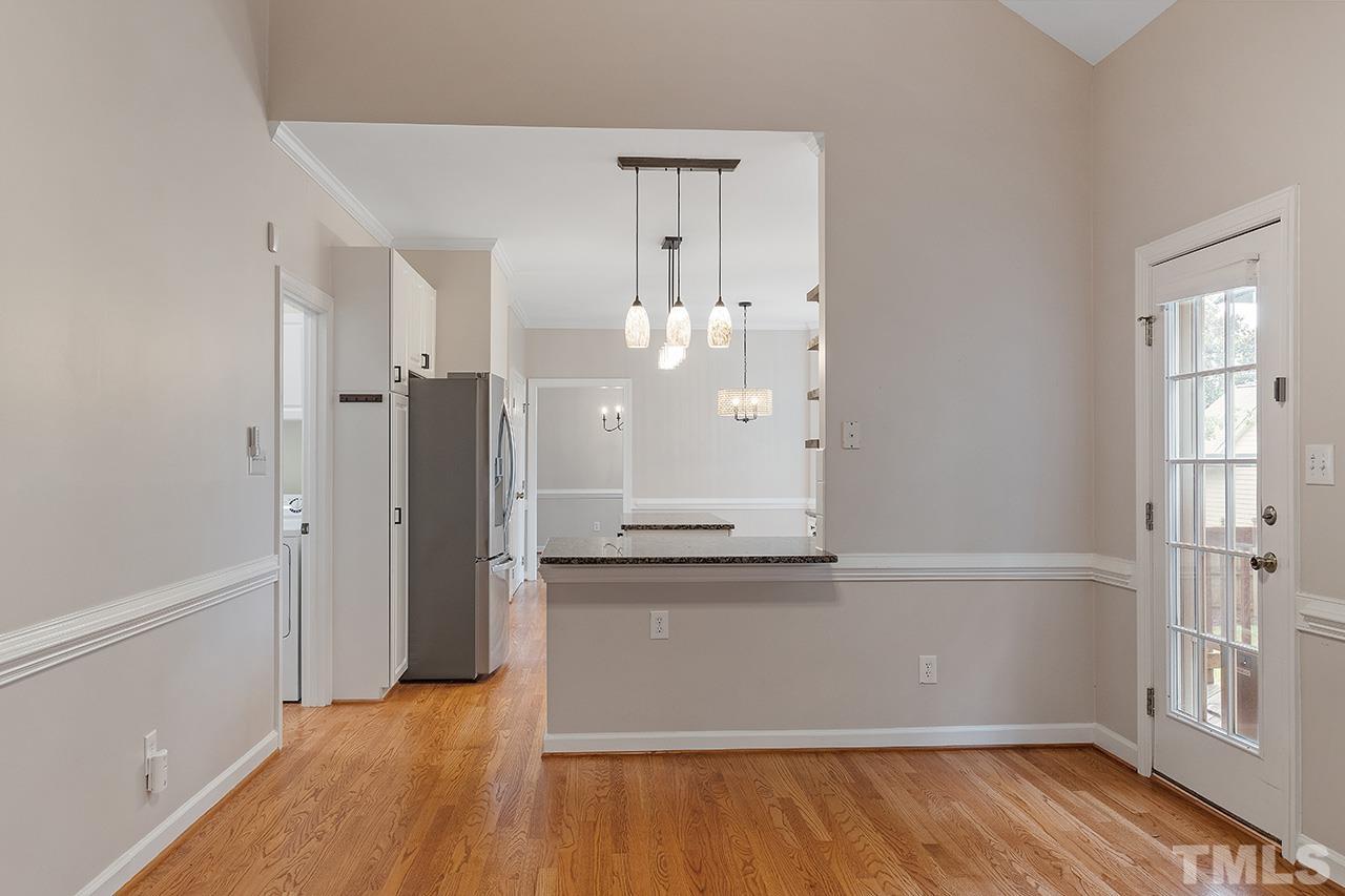 403 Danton Drive Cary, NC 27518 - Photo 11 of 38 wooden floor in an empty room with a window