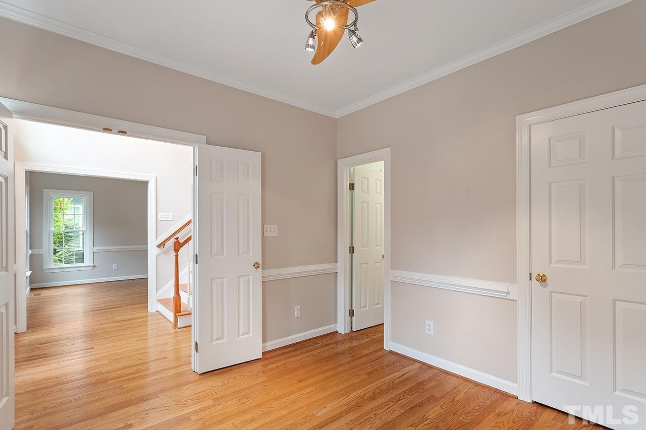 403 Danton Drive Cary, NC 27518 - Photo 20 of 38 wooden floor in an empty room with a window