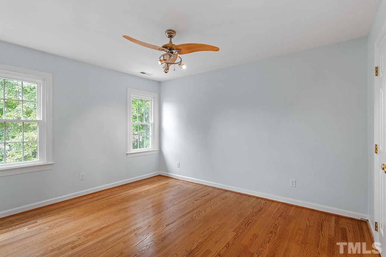 403 Danton Drive Cary, NC 27518 - Photo 28 of 38 wooden floor in an empty room with a window