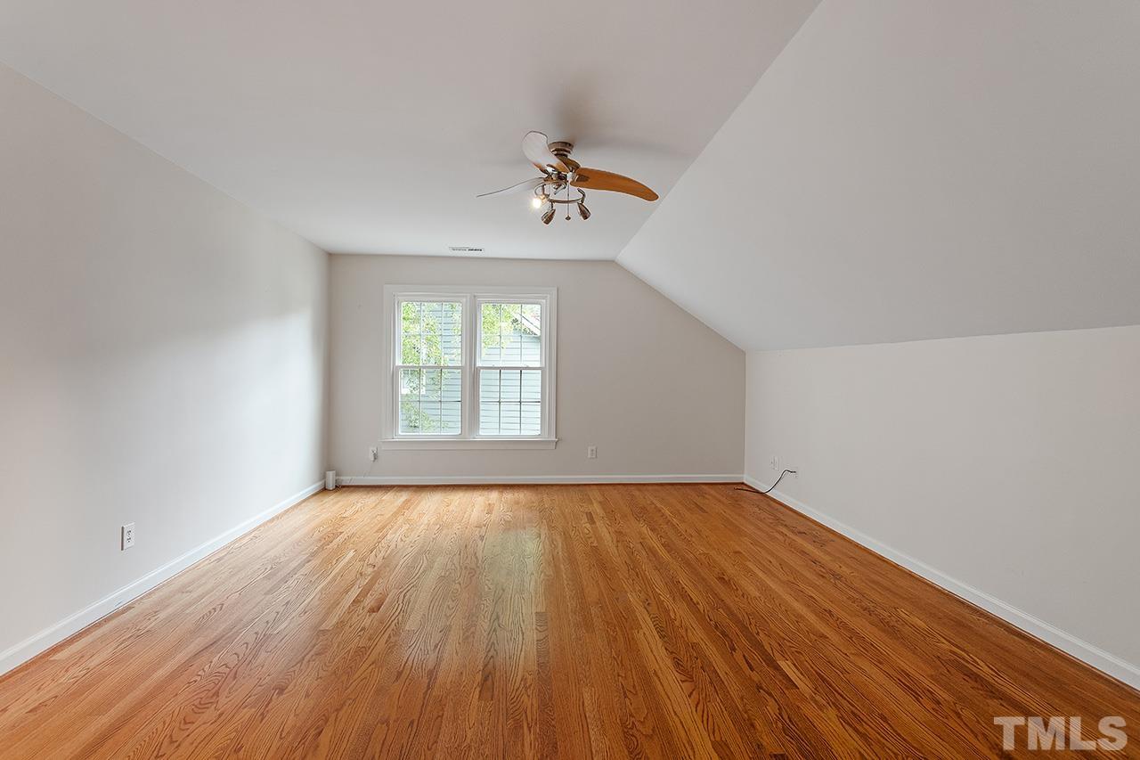 403 Danton Drive Cary, NC 27518 - Photo 31 of 38 wooden floor in an empty room with a window