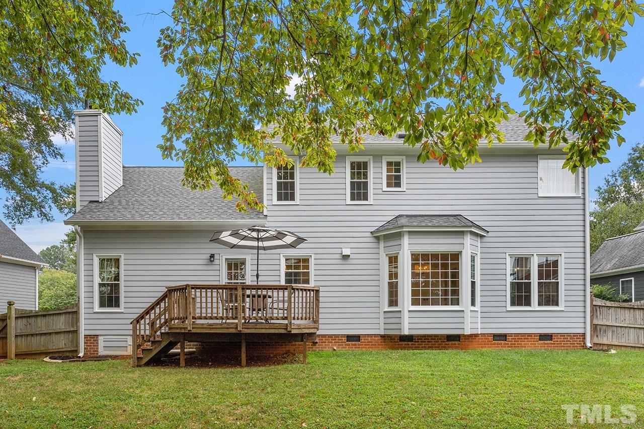 403 Danton Drive Cary, NC 27518 - Photo 34 of 38 a front view of a house with a garden