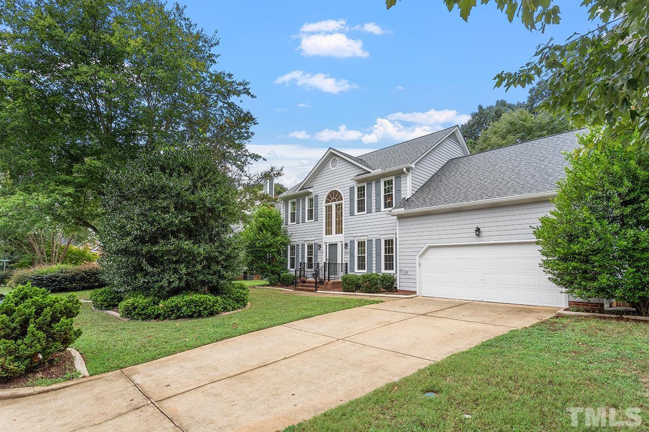 403 Danton Drive Cary, NC 27518 - Photo 36 of 38 a front view of a house with a yard and trees