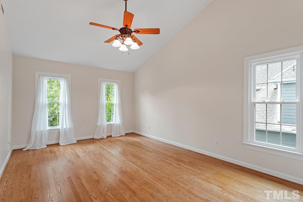 403 Danton Drive Cary, NC 27518 - Photo 5 of 38 a view of an empty room with a window