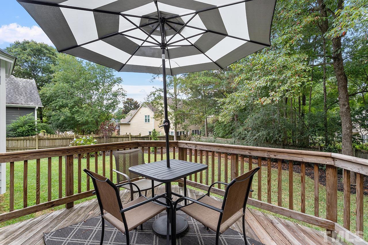 403 Danton Drive Cary, NC 27518 - Photo 6 of 38 a view of a wooden deck with furniture