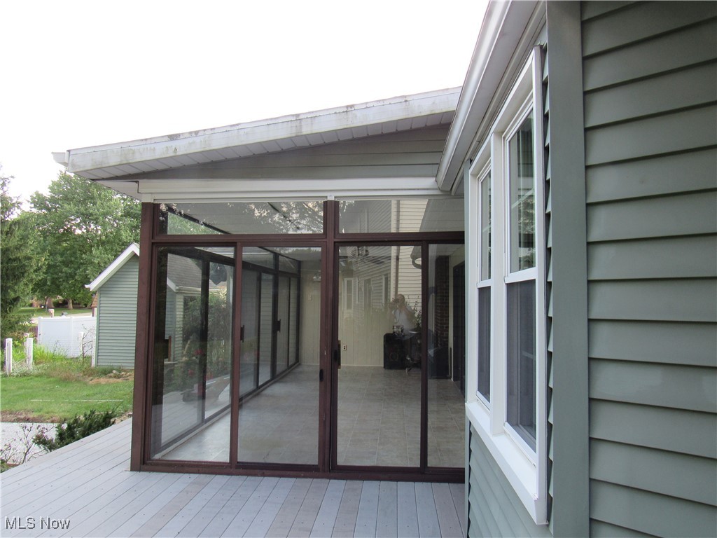 1120 Vincent Road Southeast North Canton, OH 44720 - Photo 48 of 50 Deck leading to Sunroom