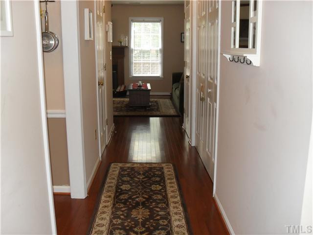 126 Timber Ridge Drive Durham, NC 27713 - Photo 11 of 16 Hall Way Of Foryer That Has New Hardwood Floors. The 1/2 Bath, Coat Closet and Utility Closet Are On The Hall Way Other