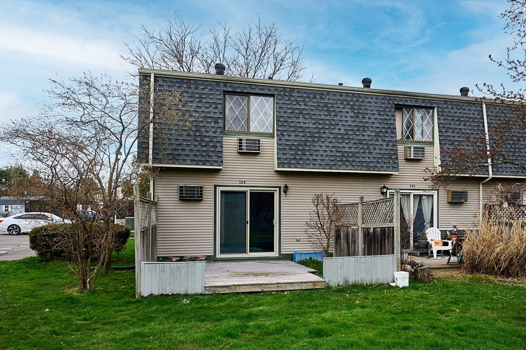 170 East Hadley Road, Unit 124 Amherst, MA 01002 - Photo 17 of 20 front view of a house with a yard