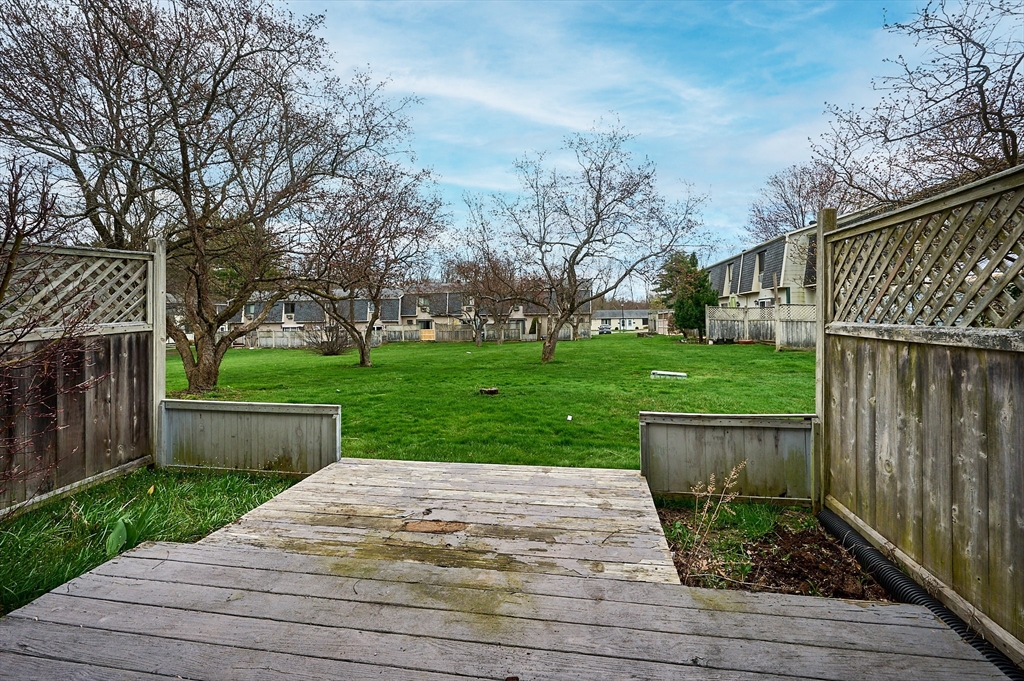 170 East Hadley Road, Unit 124 Amherst, MA 01002 - Photo 18 of 20 a view of a garden with a slide