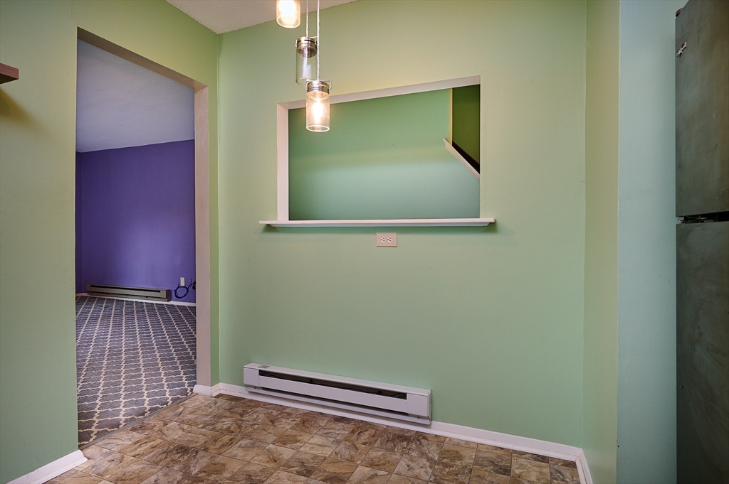 170 East Hadley Road, Unit 124 Amherst, MA 01002 - Photo 4 of 20 a view of livingroom with washer and dryer