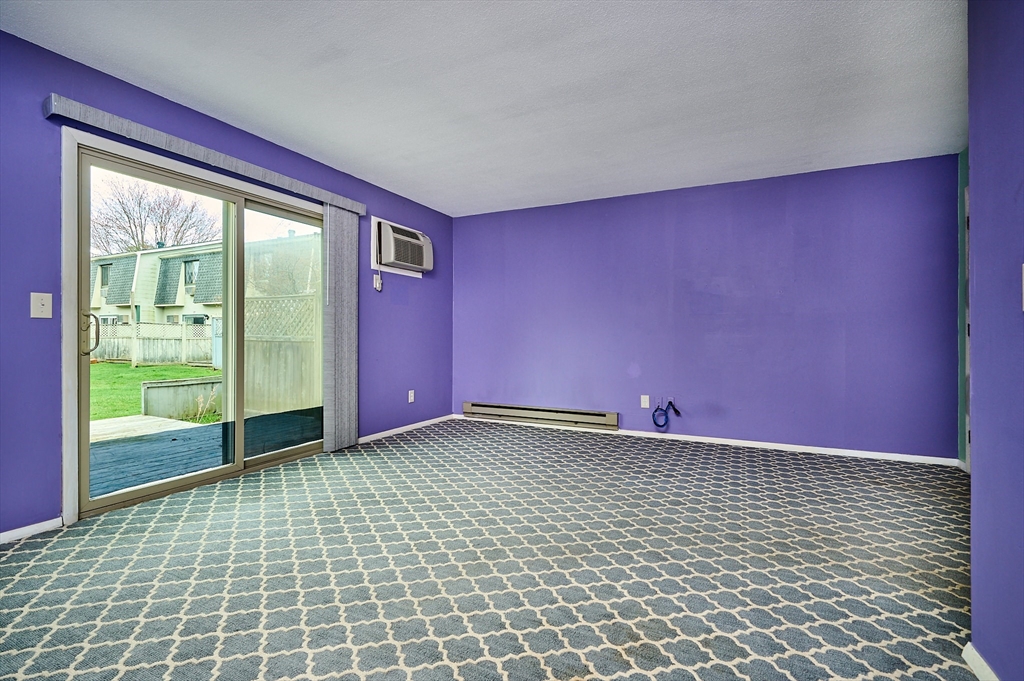 170 East Hadley Road, Unit 124 Amherst, MA 01002 - Photo 6 of 20 a view of empty room with window