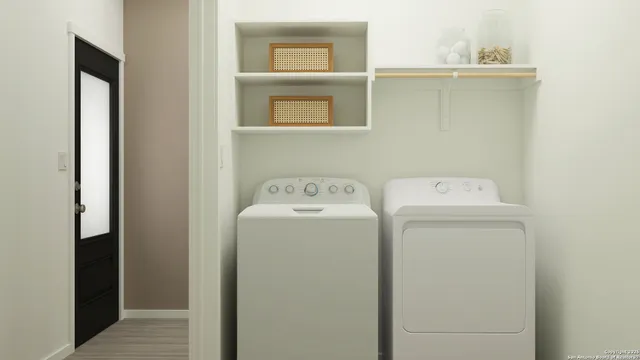 a utility room with dryer and washer
