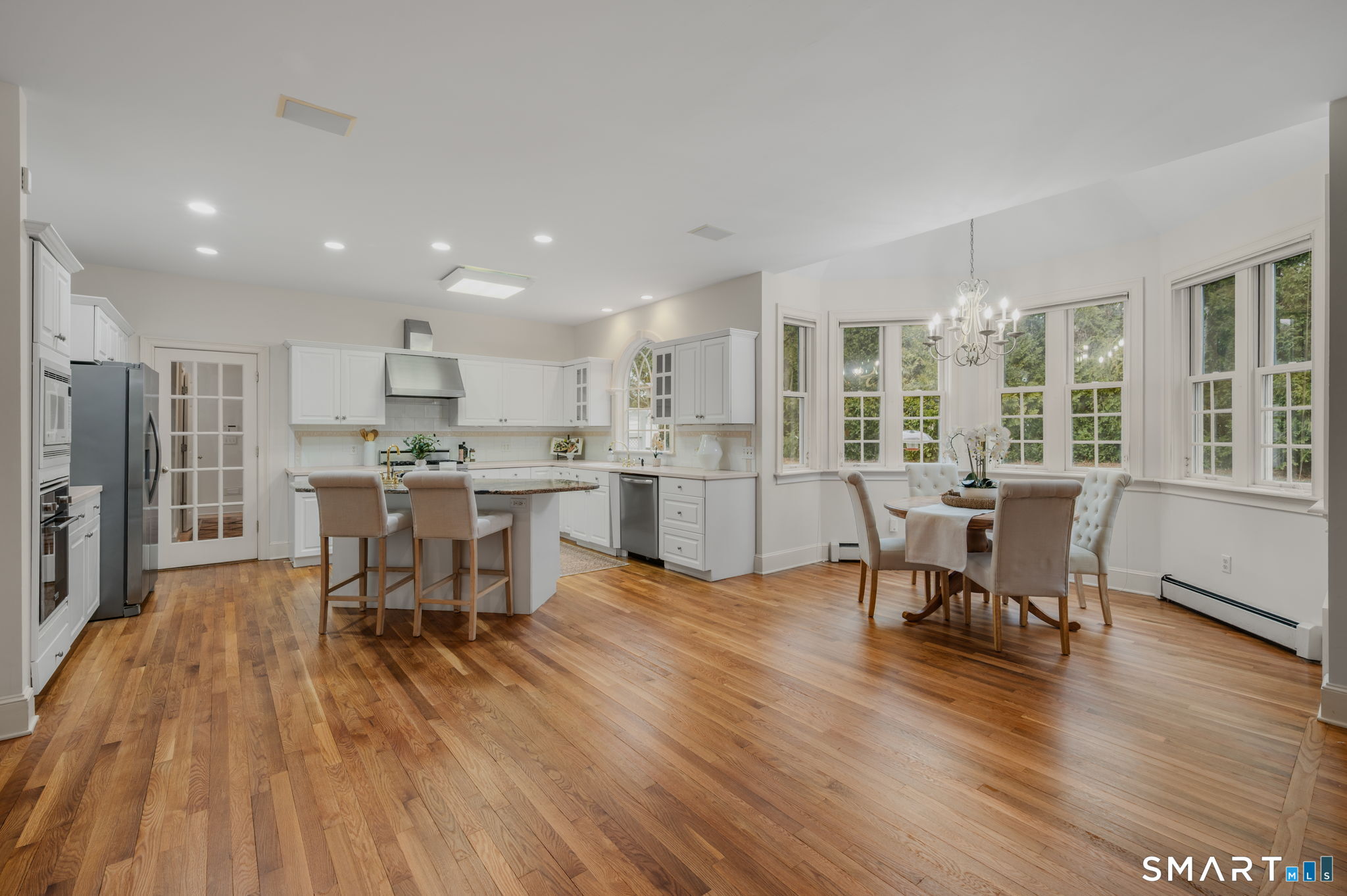 14 Riverside Drive Waterford, CT 06385 - Photo 14 of 40 a view of a dining room with furniture window and wooden floor