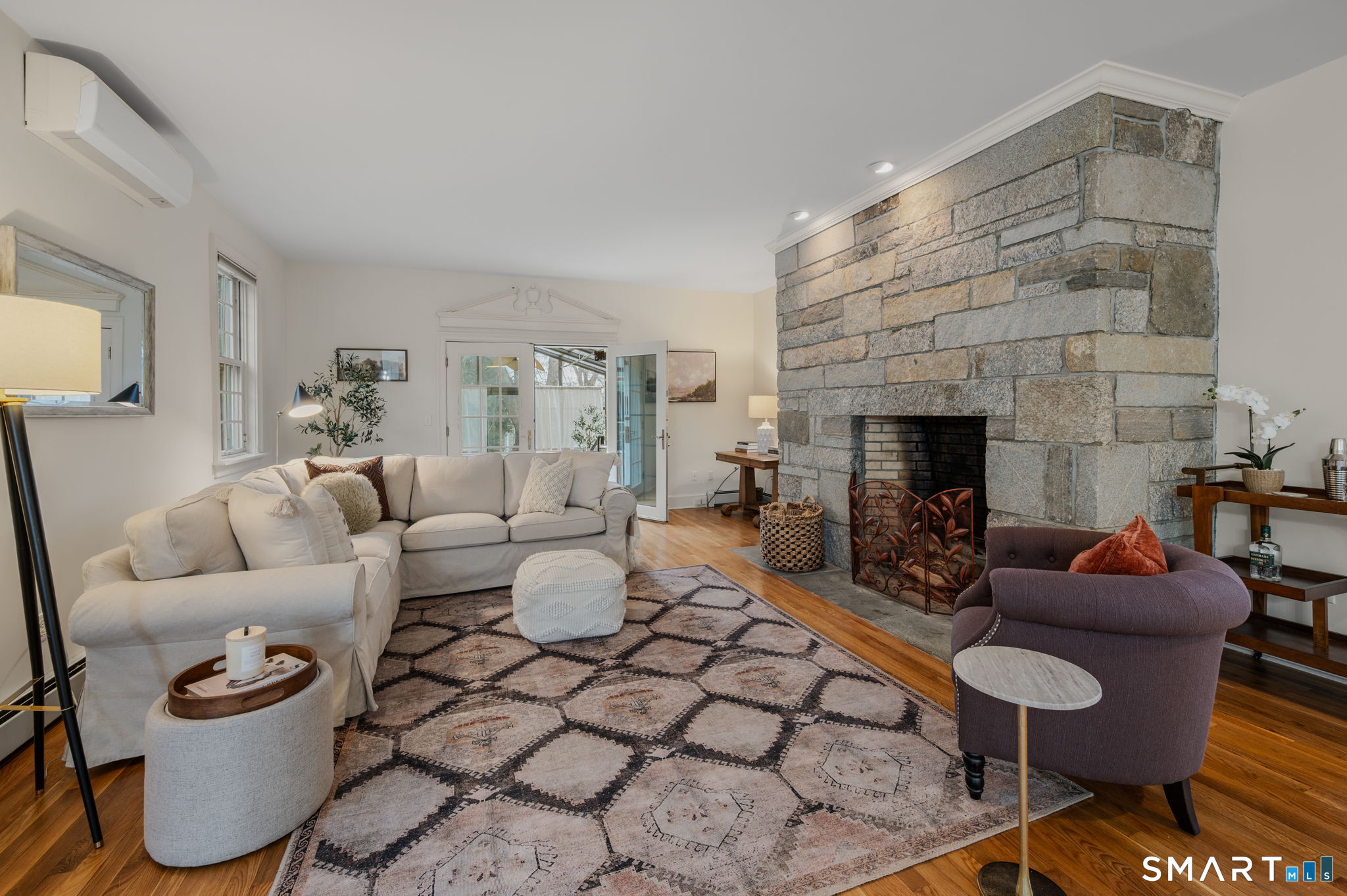 14 Riverside Drive Waterford, CT 06385 - Photo 16 of 40 a living room with furniture and a fireplace