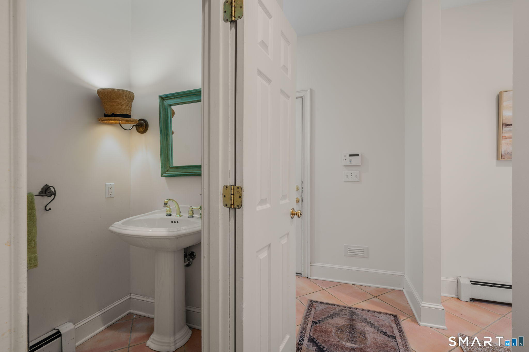 14 Riverside Drive Waterford, CT 06385 - Photo 20 of 40 a bathroom with a sink a mirror and shower