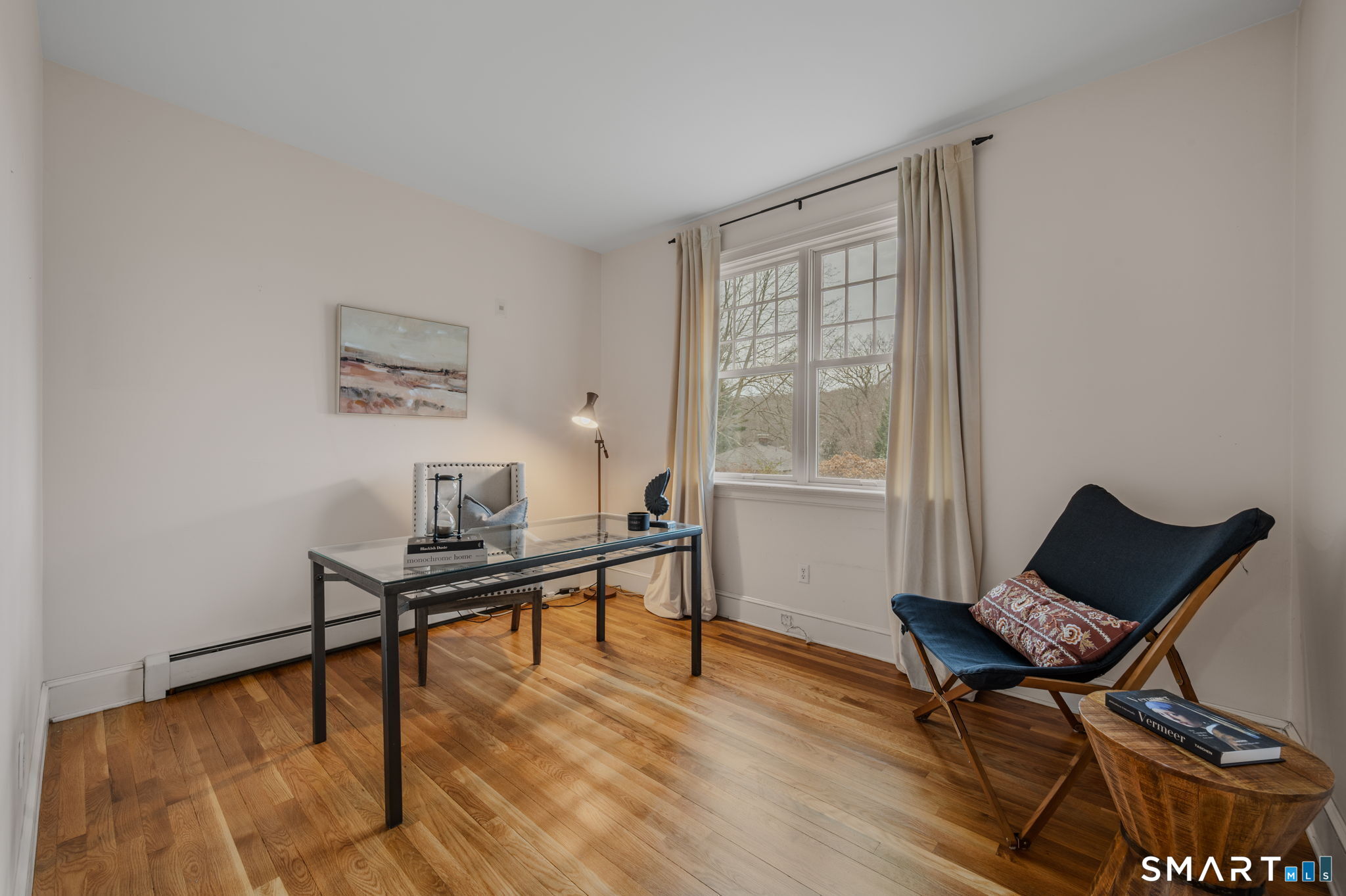 14 Riverside Drive Waterford, CT 06385 - Photo 21 of 40 a view of a workspace with furniture and a window