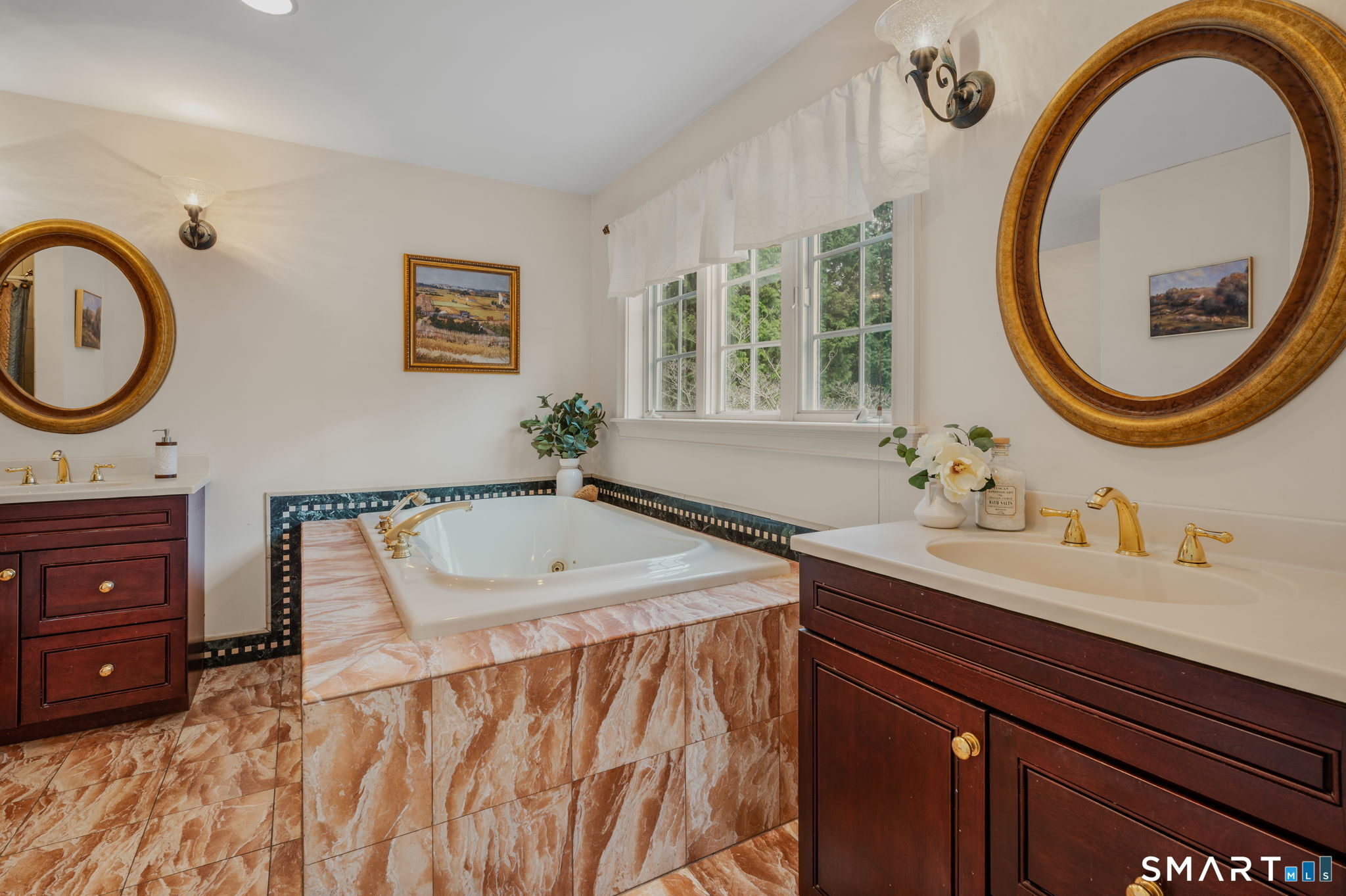 14 Riverside Drive Waterford, CT 06385 - Photo 29 of 40 a bathroom with a sink a mirror and a window