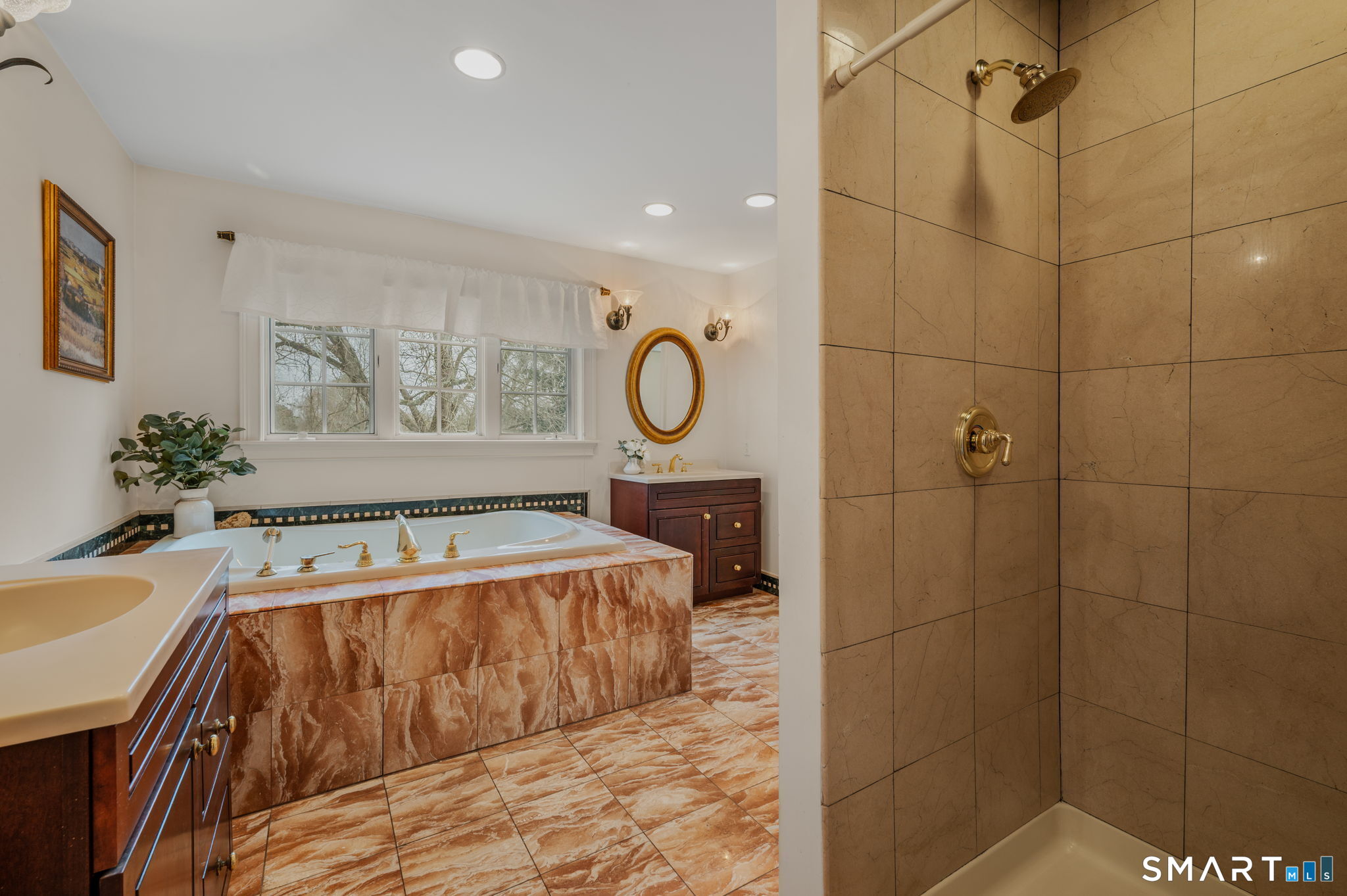 14 Riverside Drive Waterford, CT 06385 - Photo 30 of 40 a bathroom with a tub a window and a shower