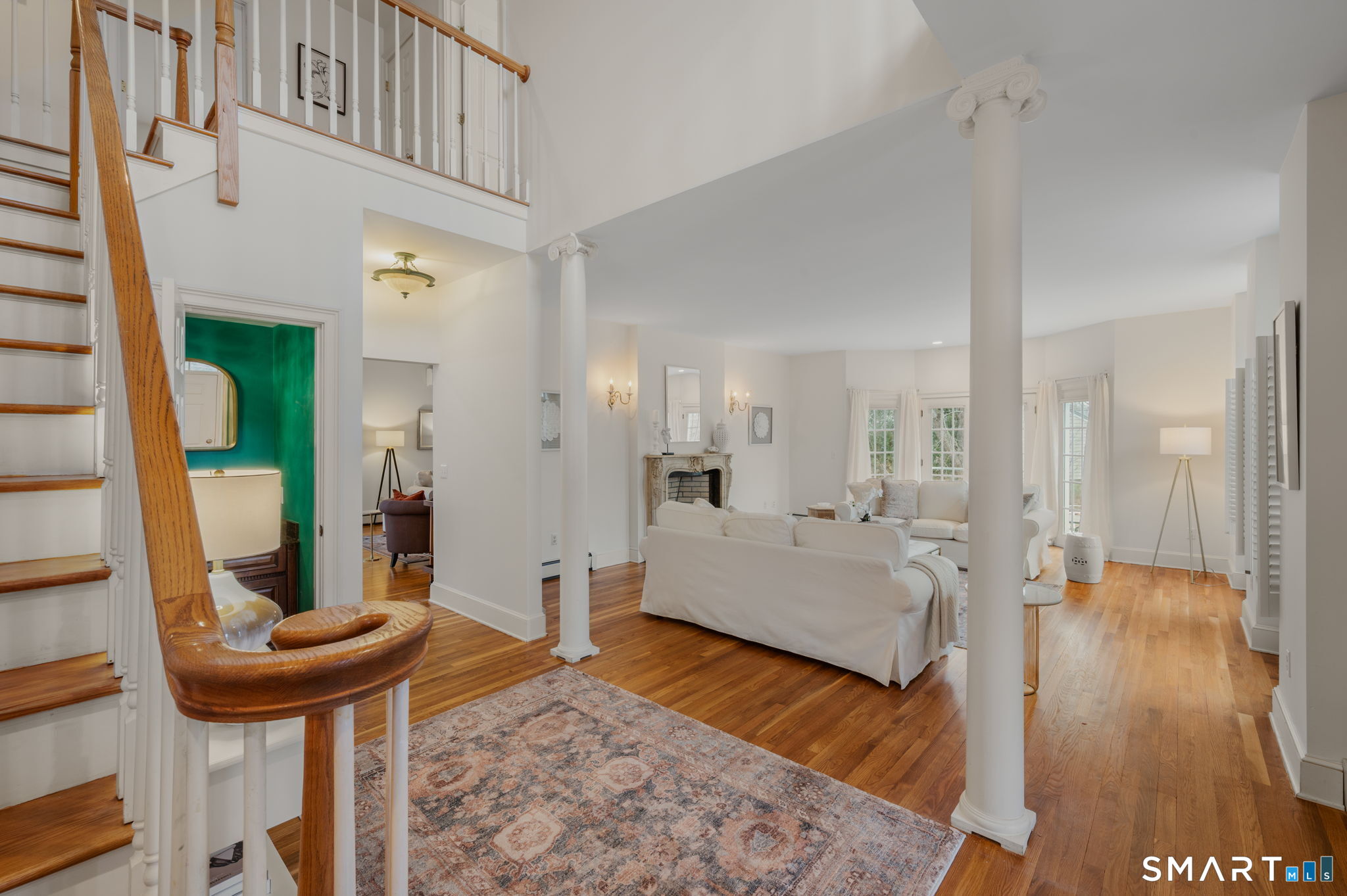14 Riverside Drive Waterford, CT 06385 - Photo 4 of 40 a living room with furniture and a wooden floor