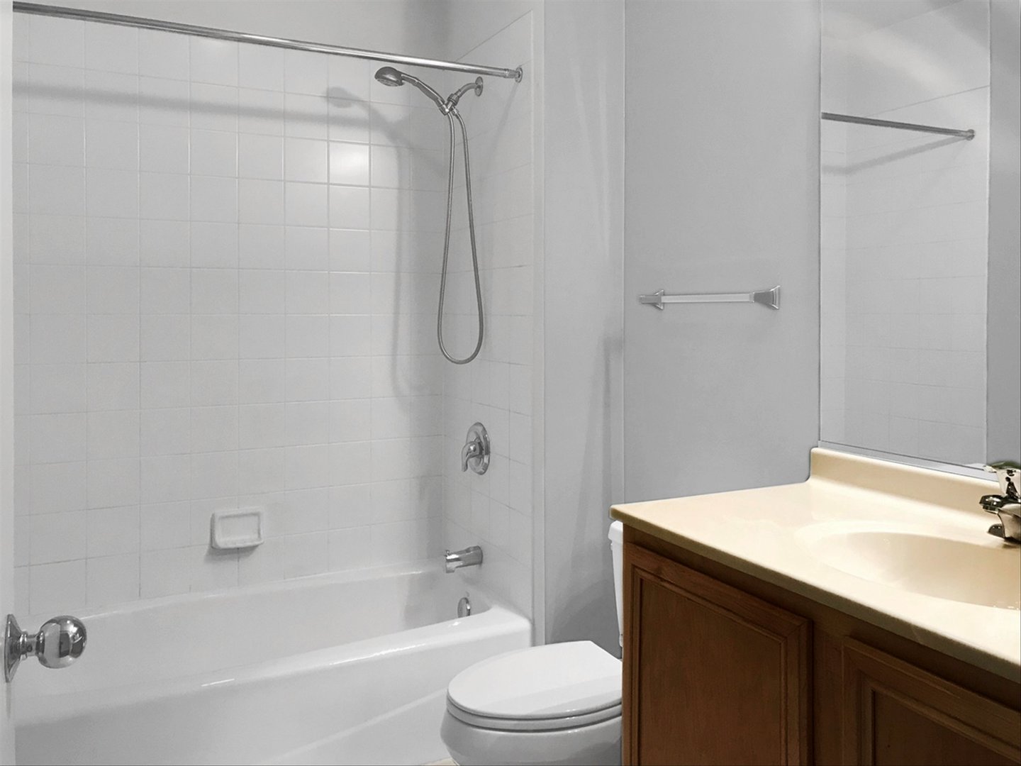 2231 West Maypole Avenue, Unit 201 Chicago, IL 60612 - Photo 8 of 10 a bathroom with a sink a toilet and shower