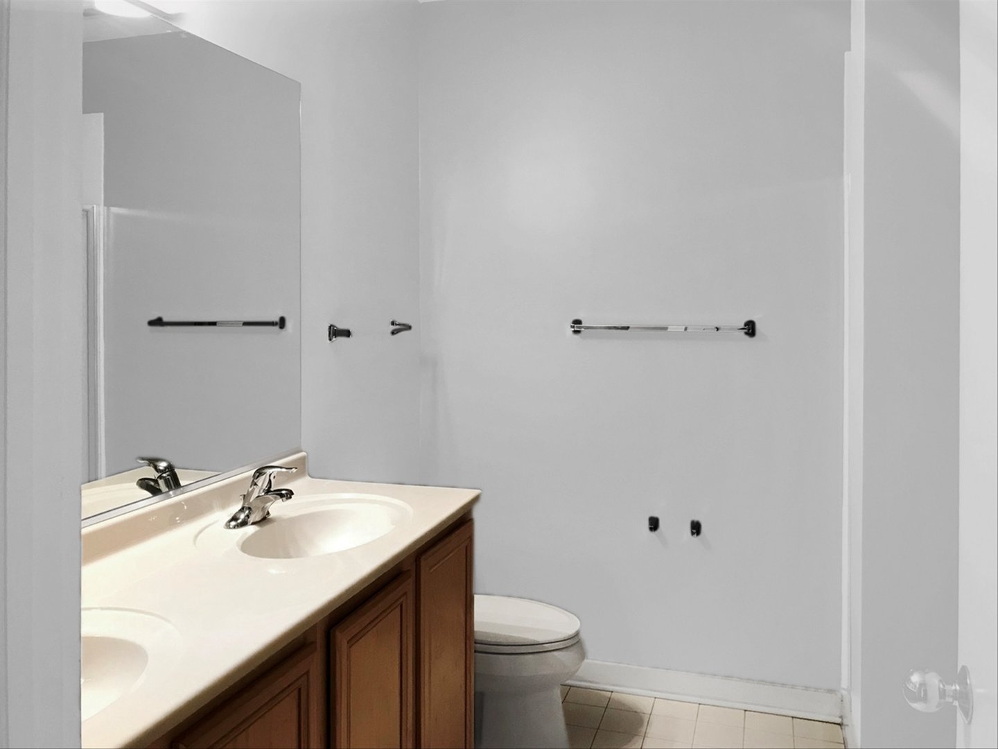 2231 West Maypole Avenue, Unit 201 Chicago, IL 60612 - Photo 9 of 10 a bathroom with a sink and a toilet
