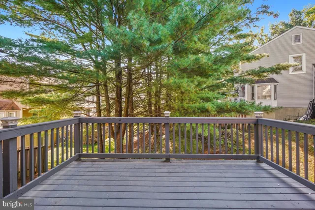 a view of balcony with wooden floor